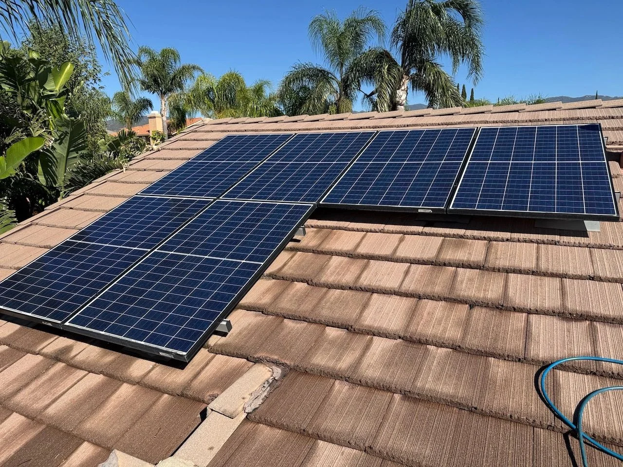 Solar panels on a tile roof, photographed by Inland Valley Solar Shine